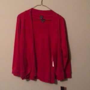 Red cotton cardigan and she’ll